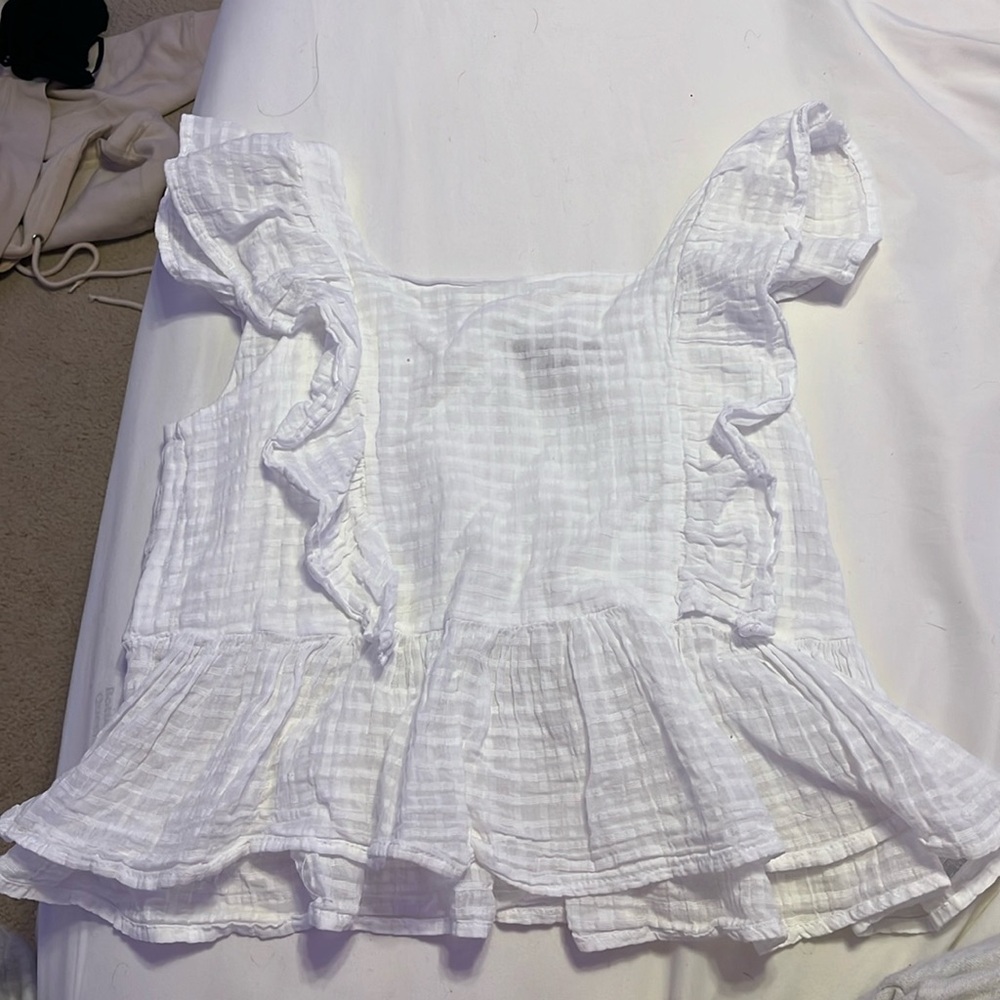 White ruffled shirt